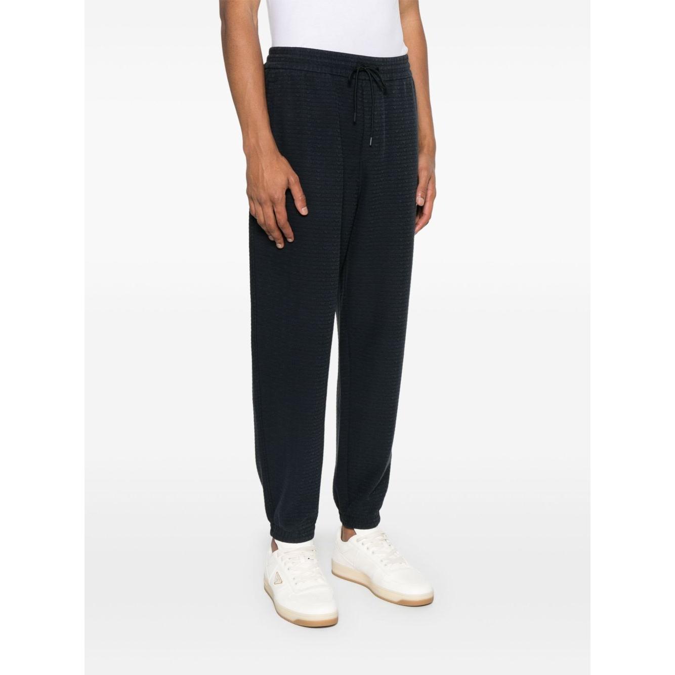 Emporio Armani ASV Lyocell blend jersey joggers with all-over lettering Trousers Emporio Armani Black