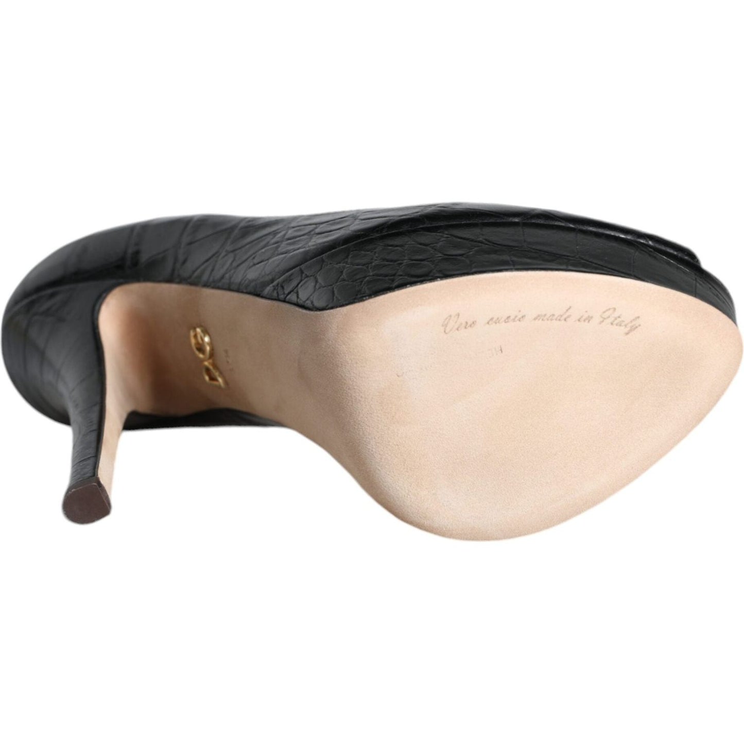 Dolce & Gabbana black leather platform heel showing underside with logo detail, made in Italy, elegant high-quality design.