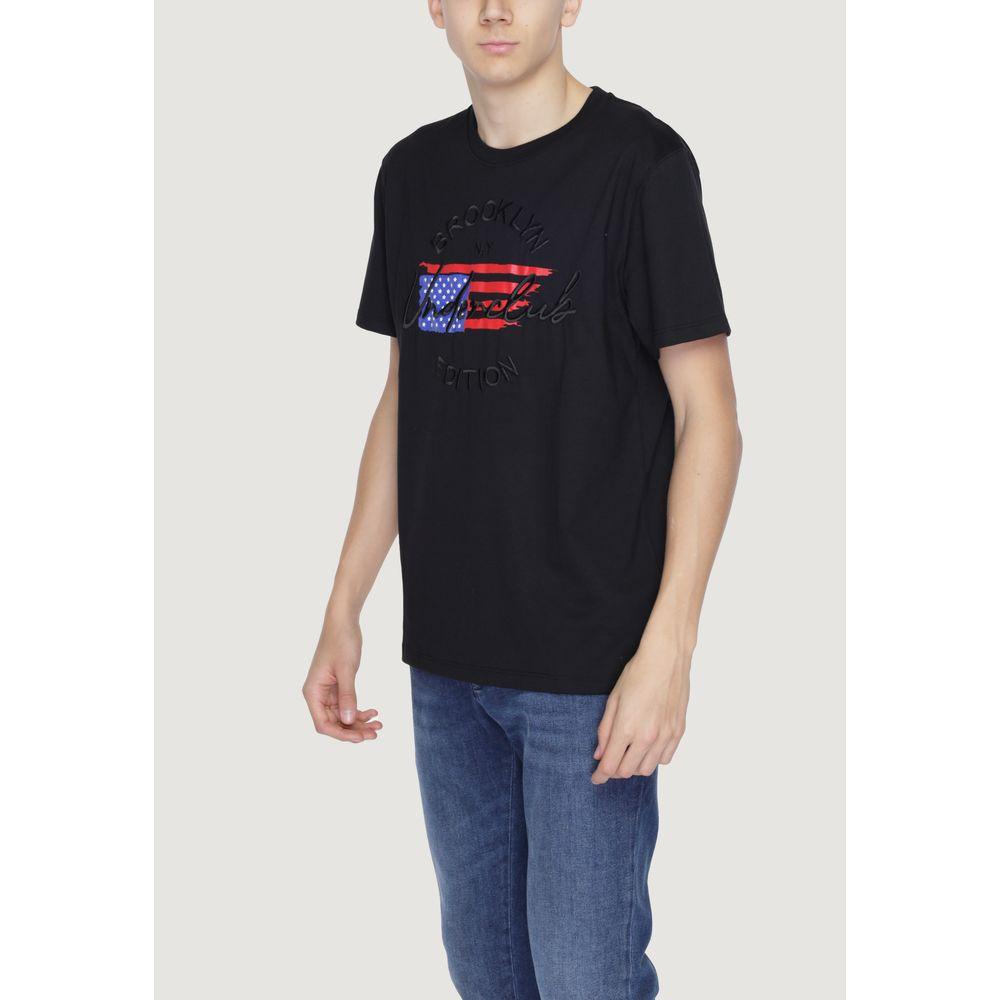 Man wearing Underclub black cotton T-shirt from the Spring/Summer collection, showcasing casual streetwear fashion.