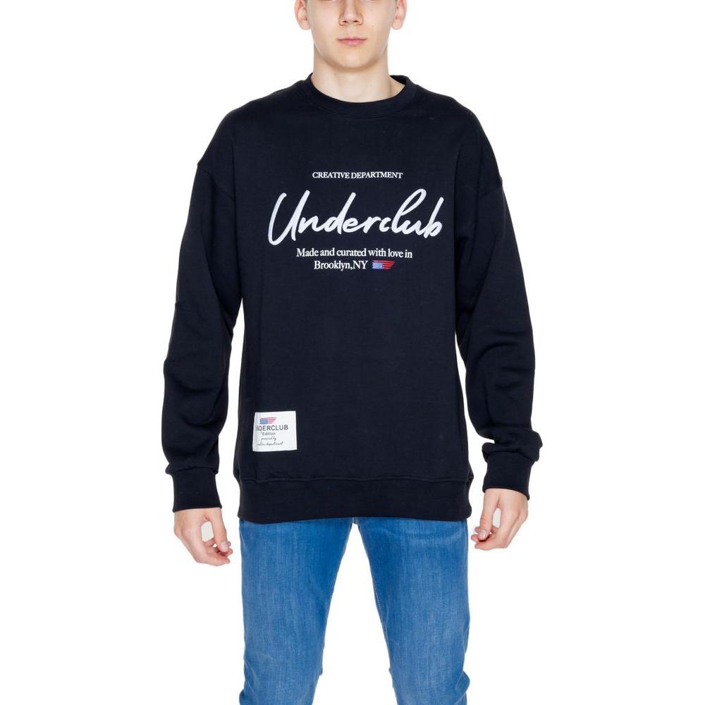 Man wearing Underclub black cotton sweater from spring/summer collection, featuring hoodless design and high-quality craftsmanship.