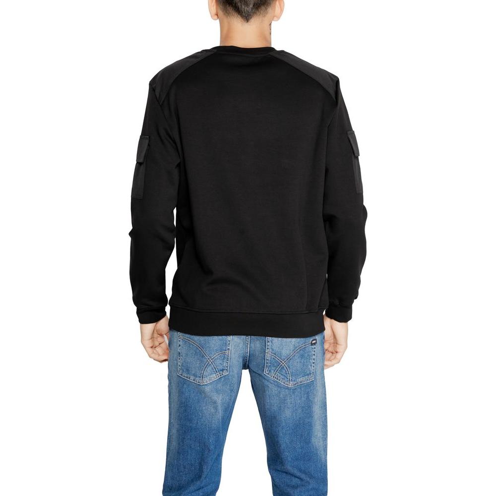 Back view of a model wearing an Antony Morato black cotton sweater, part of the fall/winter men's sweatshirt collection.