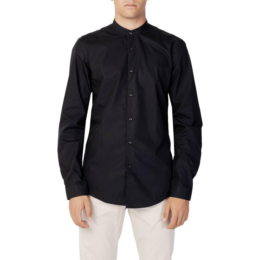 Man wearing Antony Morato black cotton slim fit shirt with long sleeves and refined collar, ideal for formal or casual occasions.