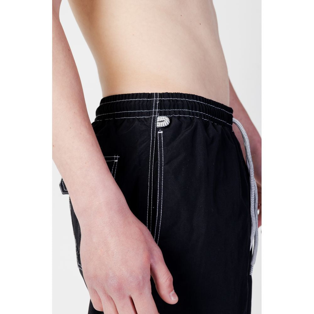 Alt Tag: Side view of men's black polyester swimwear for spring/summer collection by Blauer.