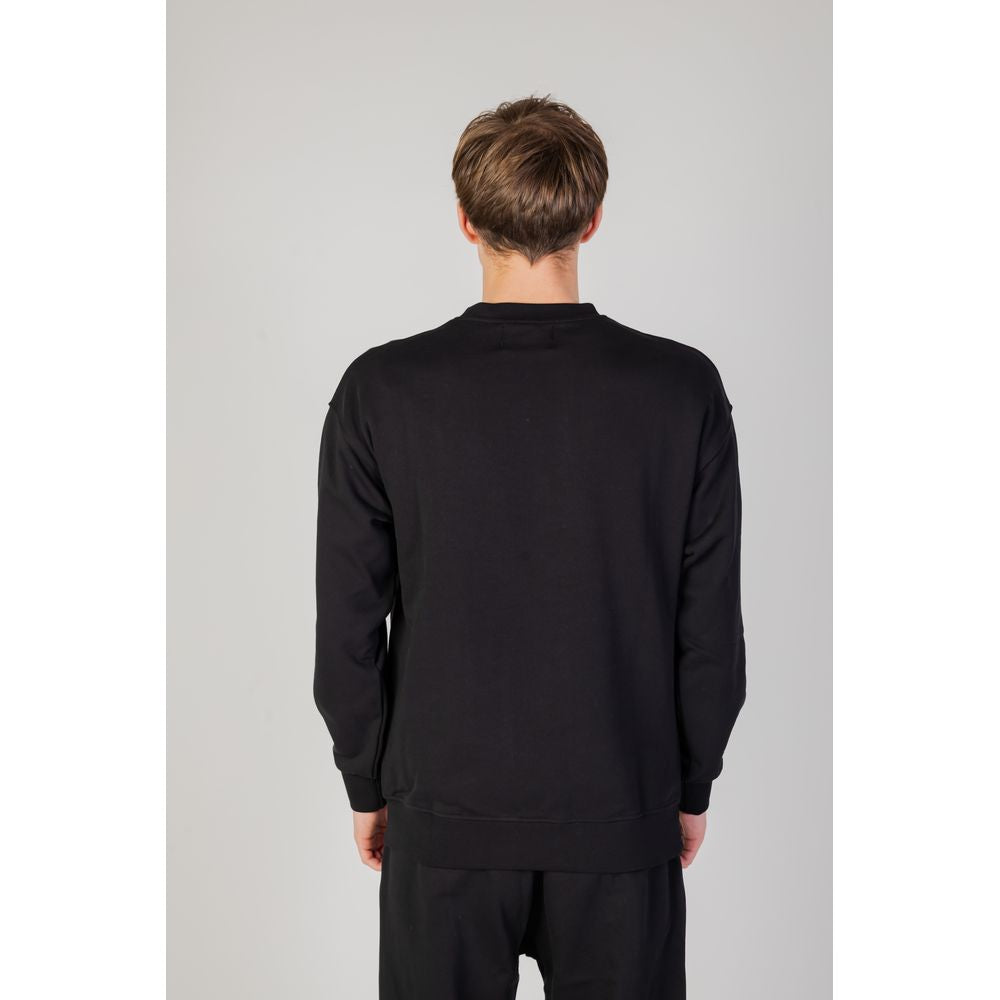 Back view of Underclub Black Cotton Sweater, men's hoodless sweatshirt from the Autumn/Winter collection, 100% cotton