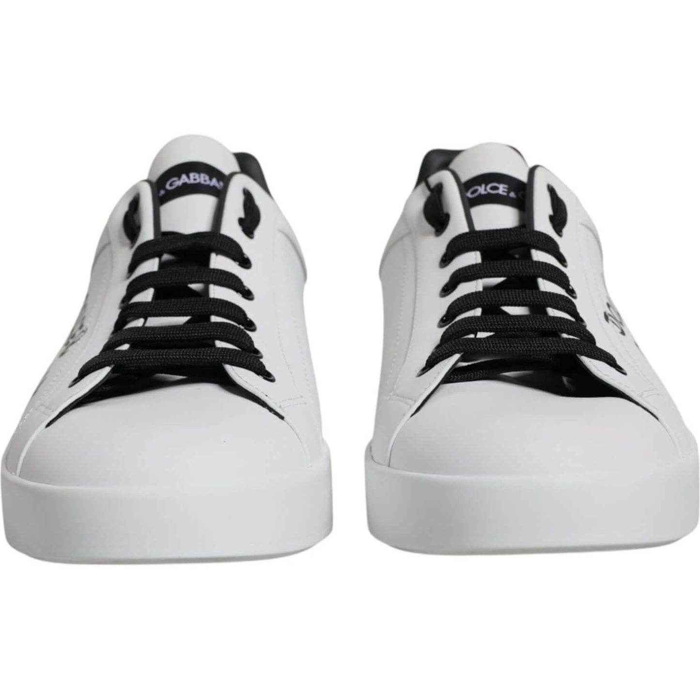 Dolce & Gabbana Portofino white leather sneakers with logo, black laces, and rubber sole. Made in Italy, lightly preowned with minor wear.