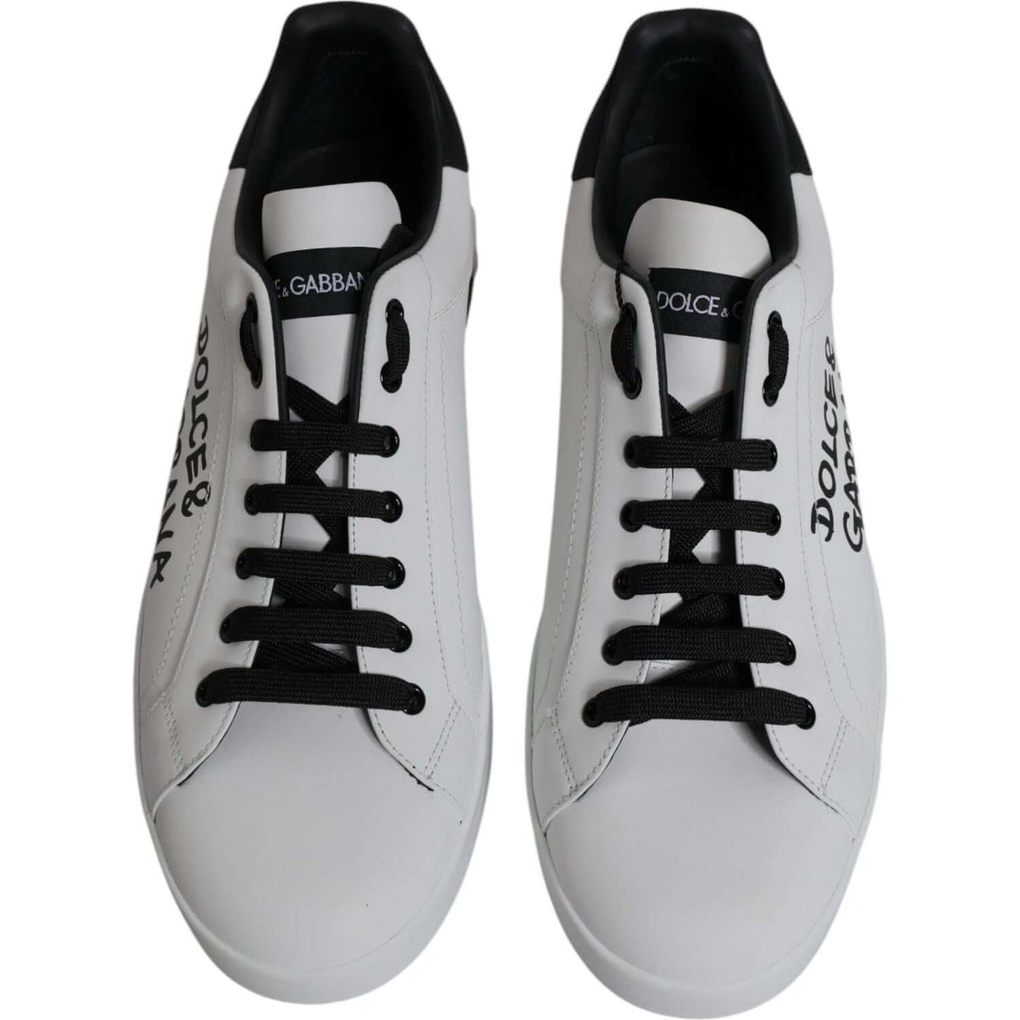 Dolce & Gabbana Portofino sneakers in white leather with logo detail, black laces, and rubber soles, crafted in Italy, lightly preowned.