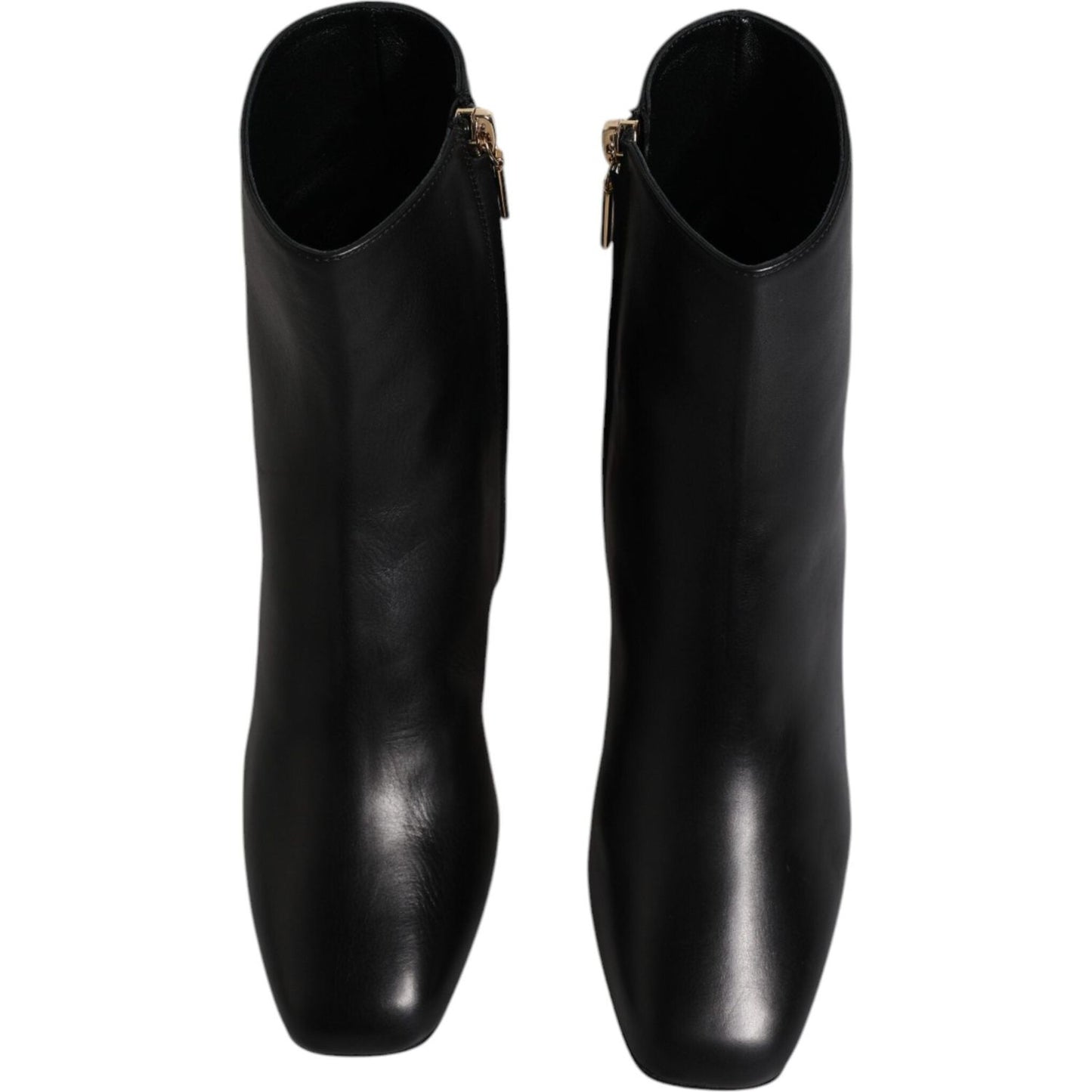 Dolce & Gabbana black leather mid-calf boots with side zipper, made in Italy with logo details, showcasing luxury craftsmanship.