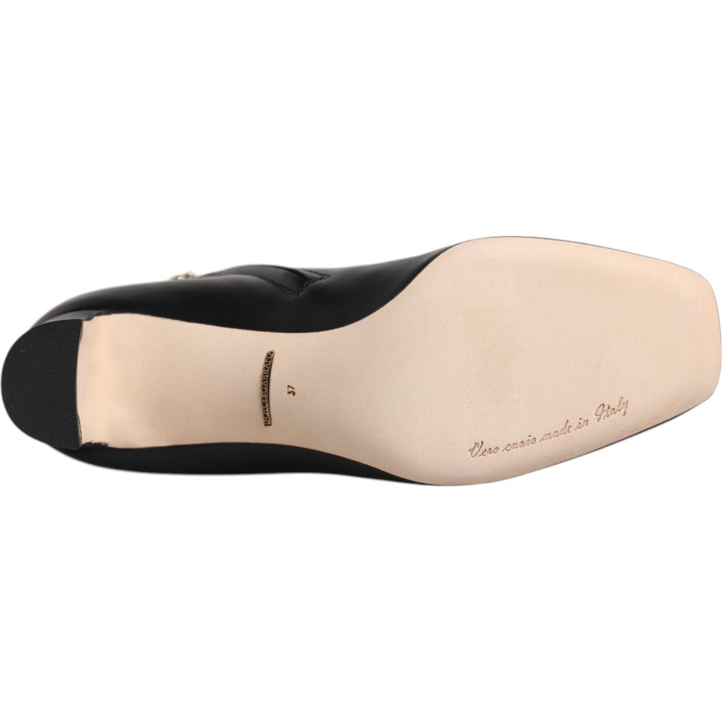 Dolce & Gabbana black mid calf leather boot with beige sole showing Italian craftsmanship and logo details.
