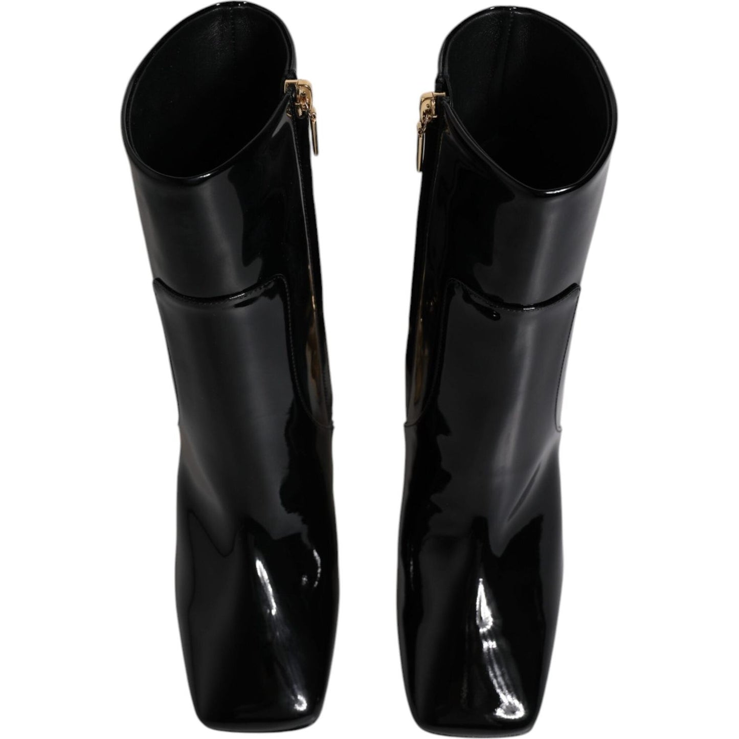 Dolce & Gabbana black mid calf boots made in Italy, featuring side zipper and leather sole, crafted with high-quality calf leather.