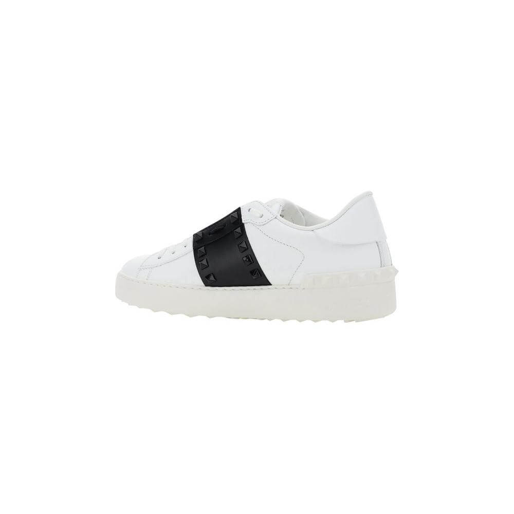 Valentino Garavani Rockstud Open Sneakers, white leather with black contrasting band, slip-on style, round toe, elegant design.