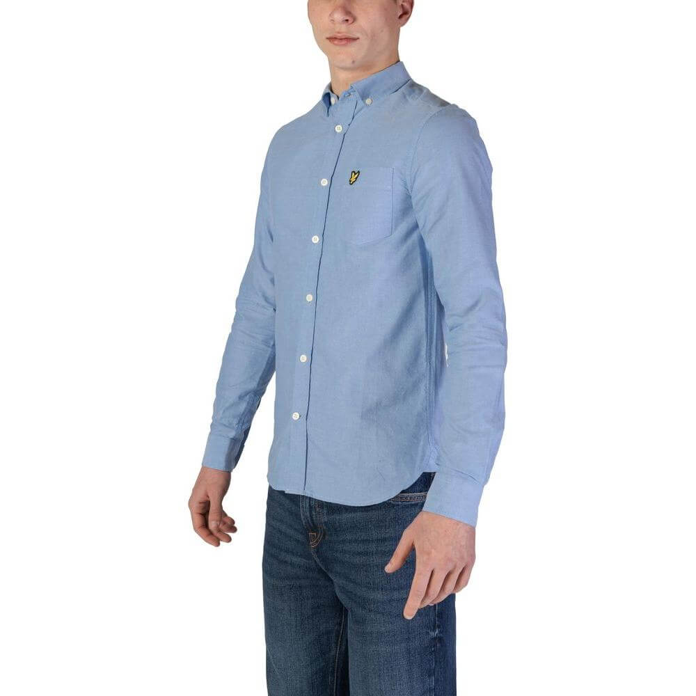 Lyle & Scott men's blue organic cotton long sleeve shirt from Fall/Winter collection worn with jeans.