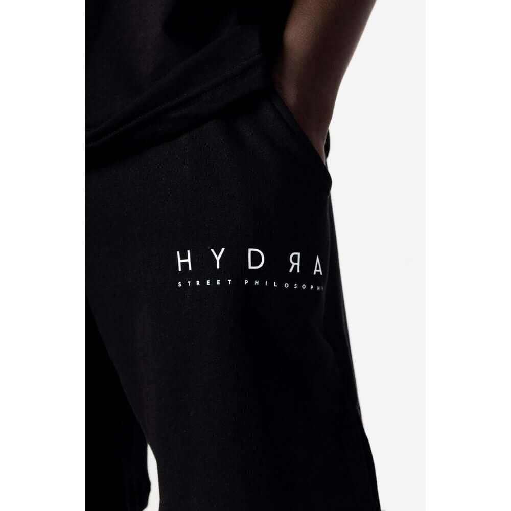 Close-up of Hydra Clothing black cotton men's short sweatsuit from the Spring/Summer collection.