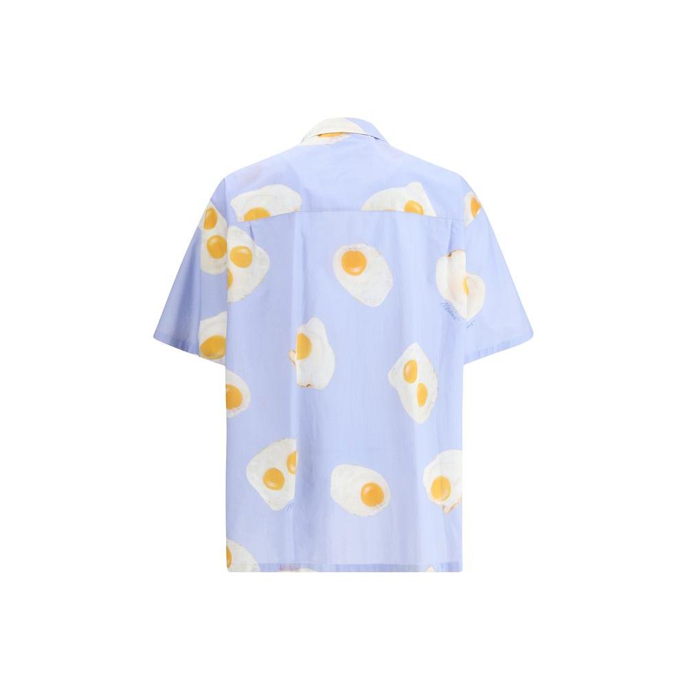 Moschino printed short sleeve shirt with egg graphics and classic lapels, front button closure, playful and modern design.