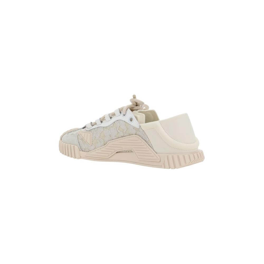 Dolce & Gabbana sneaker with textured rubber sole, lace upper, and logoed laces, showcasing side monogram and round toe design.