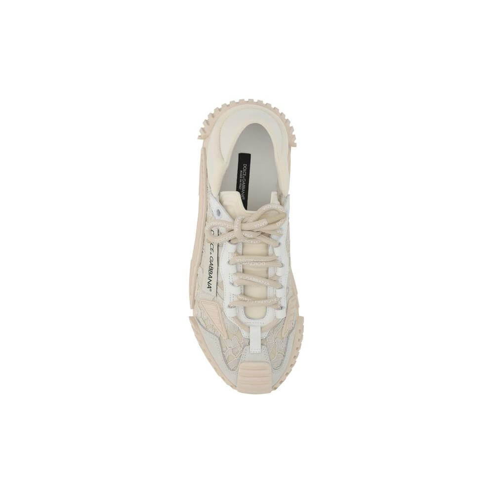 Top view of Dolce & Gabbana sneakers with textured superflex rubber sole, lace and fabric upper, and logoed tubular laces.