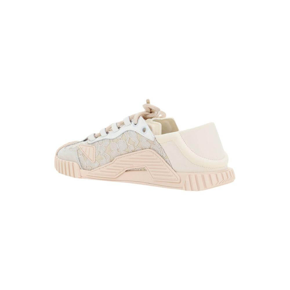 Dolce & Gabbana sneaker with textured rubber sole, lace and fabric upper, side lugs, and iconic monogram on side panel.