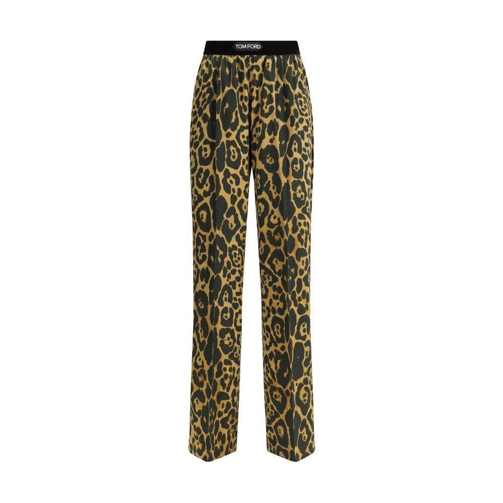 Tom Ford silk pants with animal print, elastic waistband, side welt pockets, and back patch slit pockets, combining elegance and comfort.