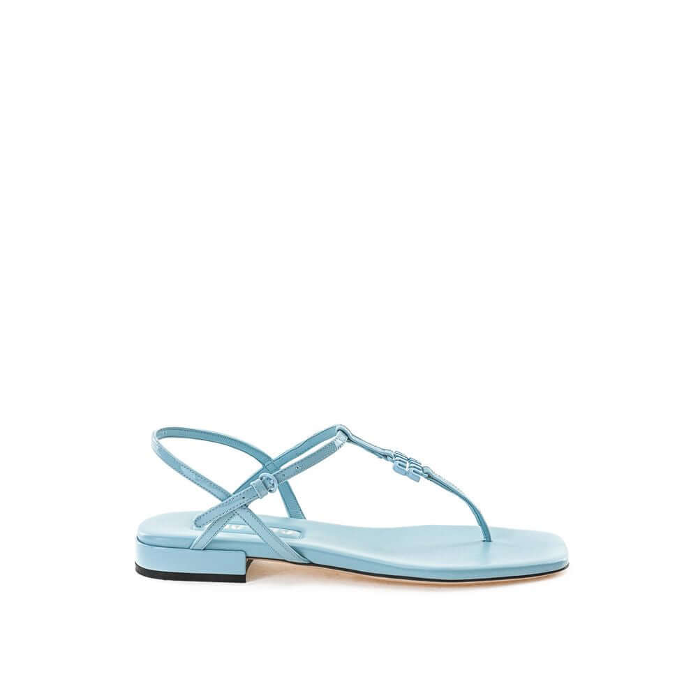 Miu Miu azure patent leather sandal, square toe, T-style strap, logo detail, leather sole, contrasting black under heel.