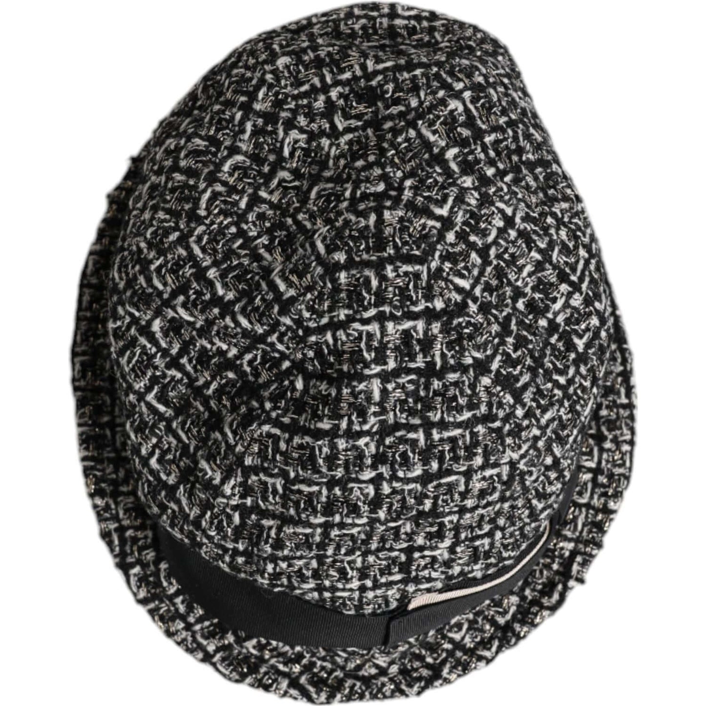 Dolce & Gabbana black cotton blend bucket hat with white accents, featuring luxury texture and logo details, made in Italy.