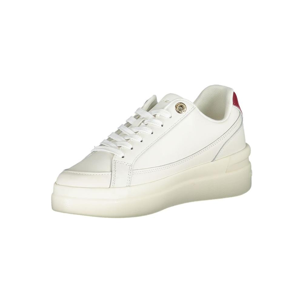 Tommy Hilfiger lace-up sneakers with contrasting details, featuring iconic logo, designed for style and comfort.
