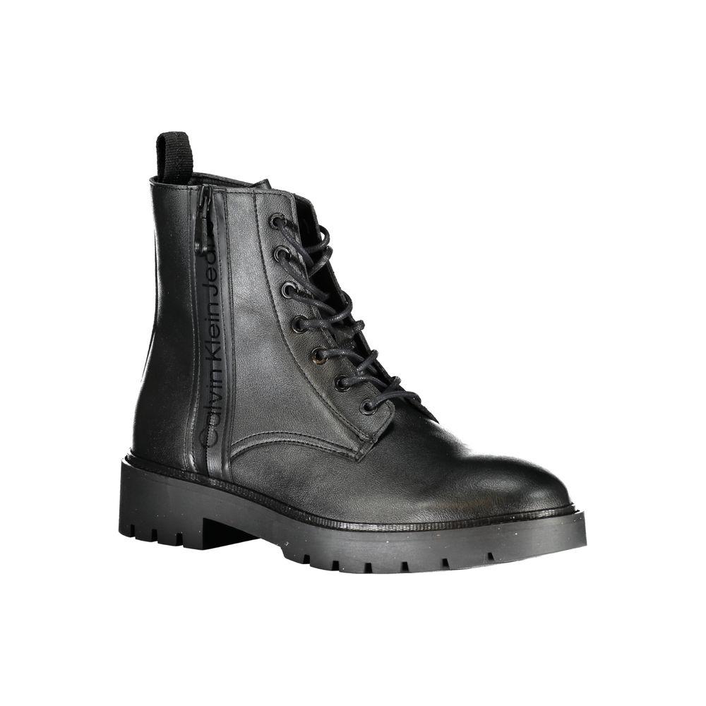Calvin Klein sleek black ankle boots with lace-up and side zip detail, featuring subtle logo. Made of durable materials, stylish footwear.