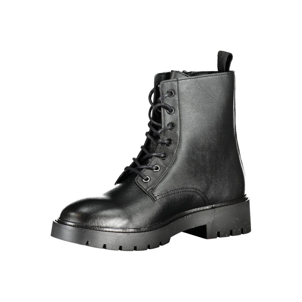 Calvin Klein sleek black ankle boots with lace-up and zip detail, crafted from 80% polyethylene, 20% polyester, made in Portugal.