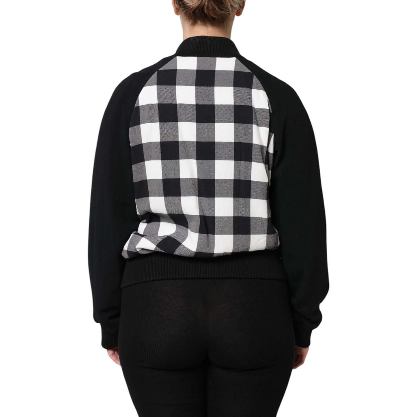 Back view of Dolce & Gabbana black and white check floral button down jacket showcasing checkered pattern and raglan sleeves.