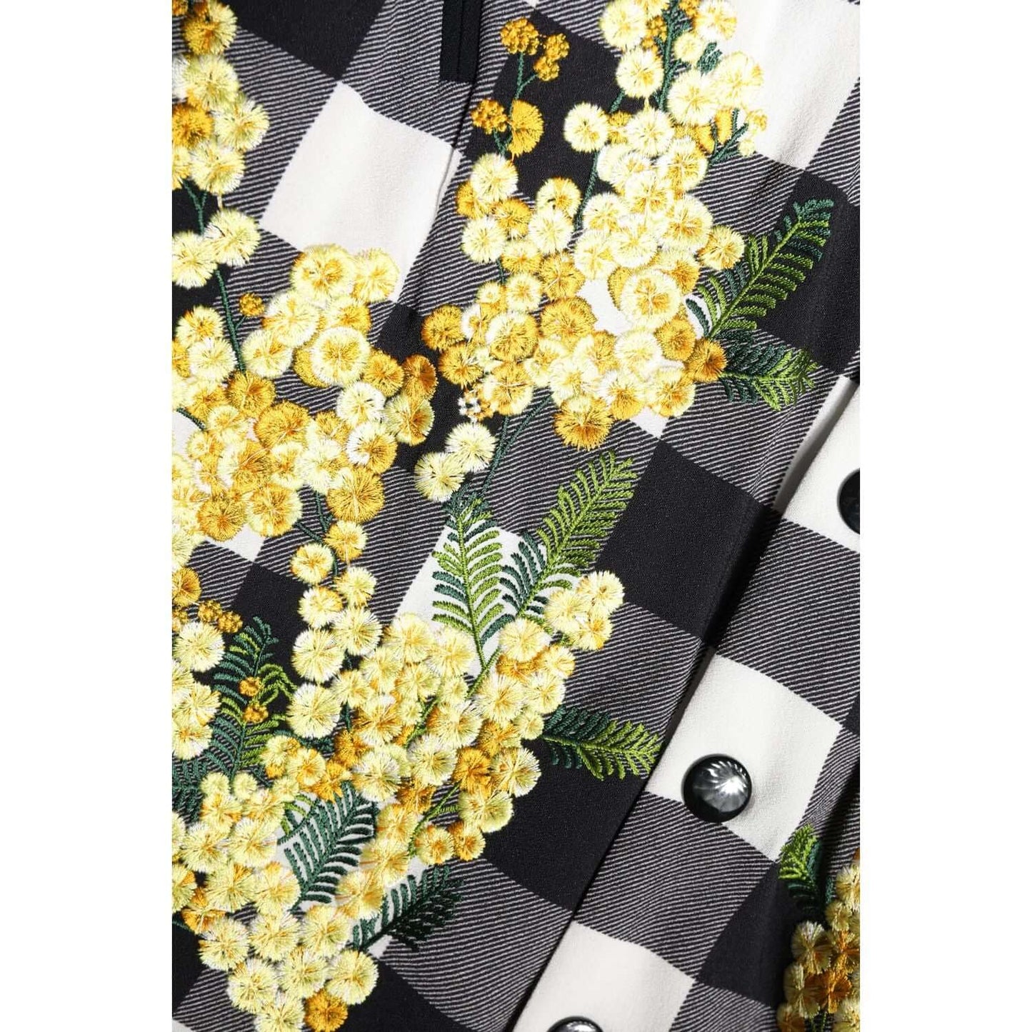 Dolce & Gabbana black white check floral button down jacket close-up with yellow floral embroidery.