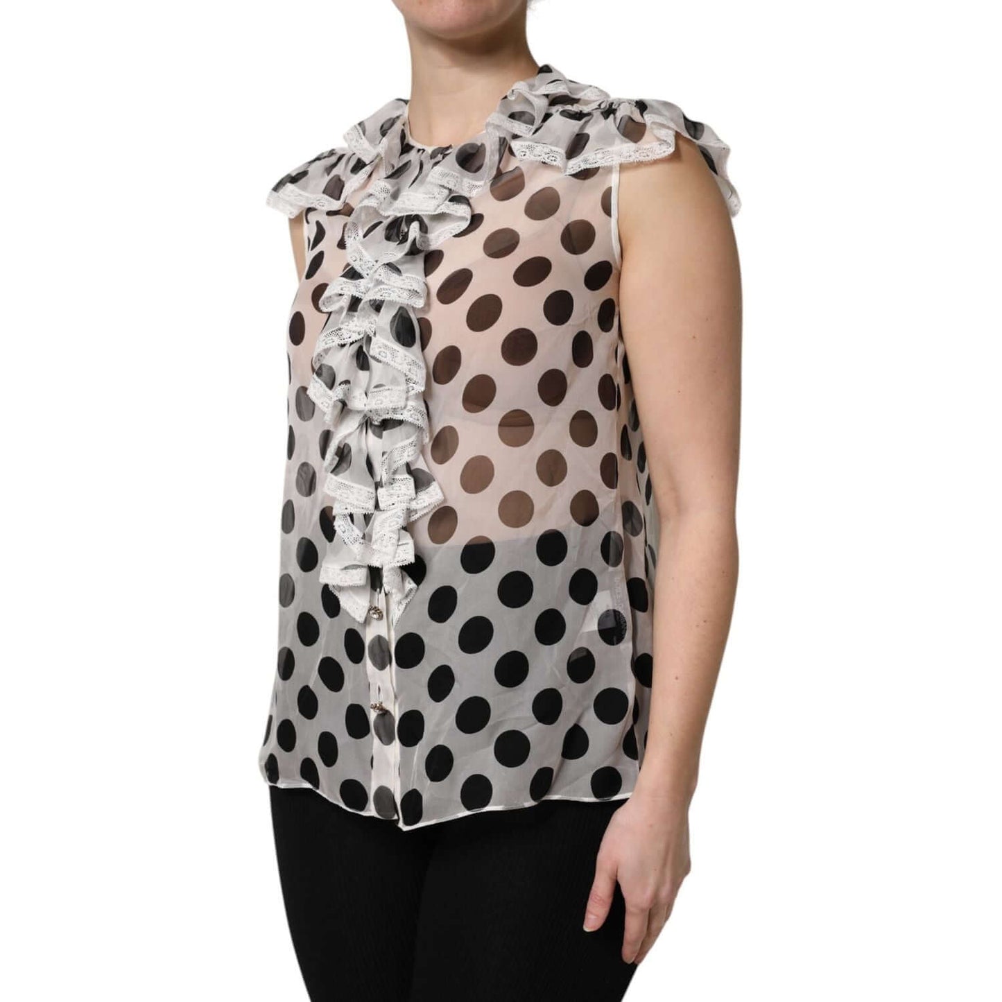 Dolce & Gabbana white black polka dot sleeveless top with ruffles, silk-cotton blend, button closure, luxurious Italian craftsmanship.