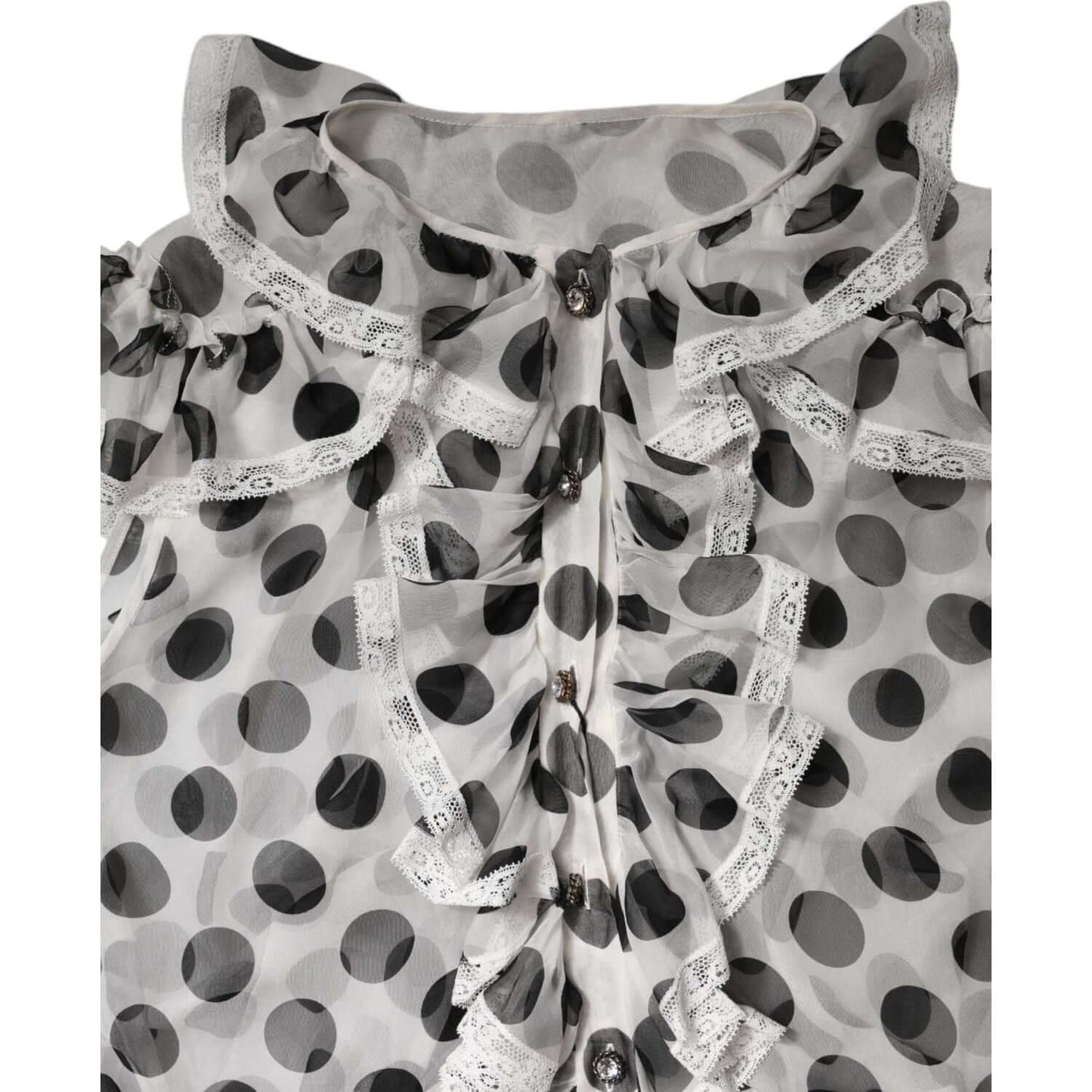 Dolce & Gabbana white and black polka dot sleeveless top with crew neck and button-down closure, featuring lace trim, made in Italy.