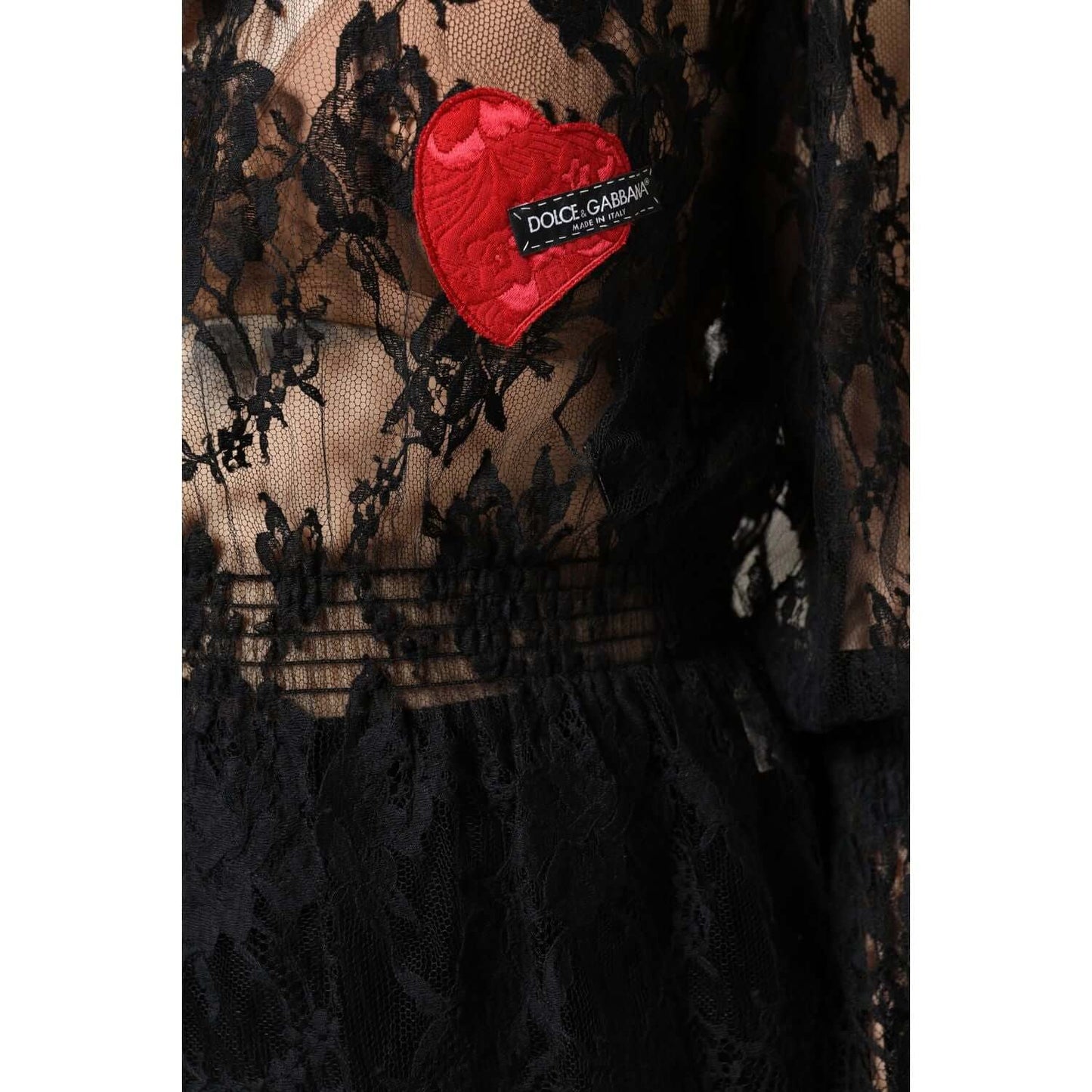 Dolce & Gabbana black floral lace blouse with red heart patch, made of cotton blend, featuring intricate design and logo detail.