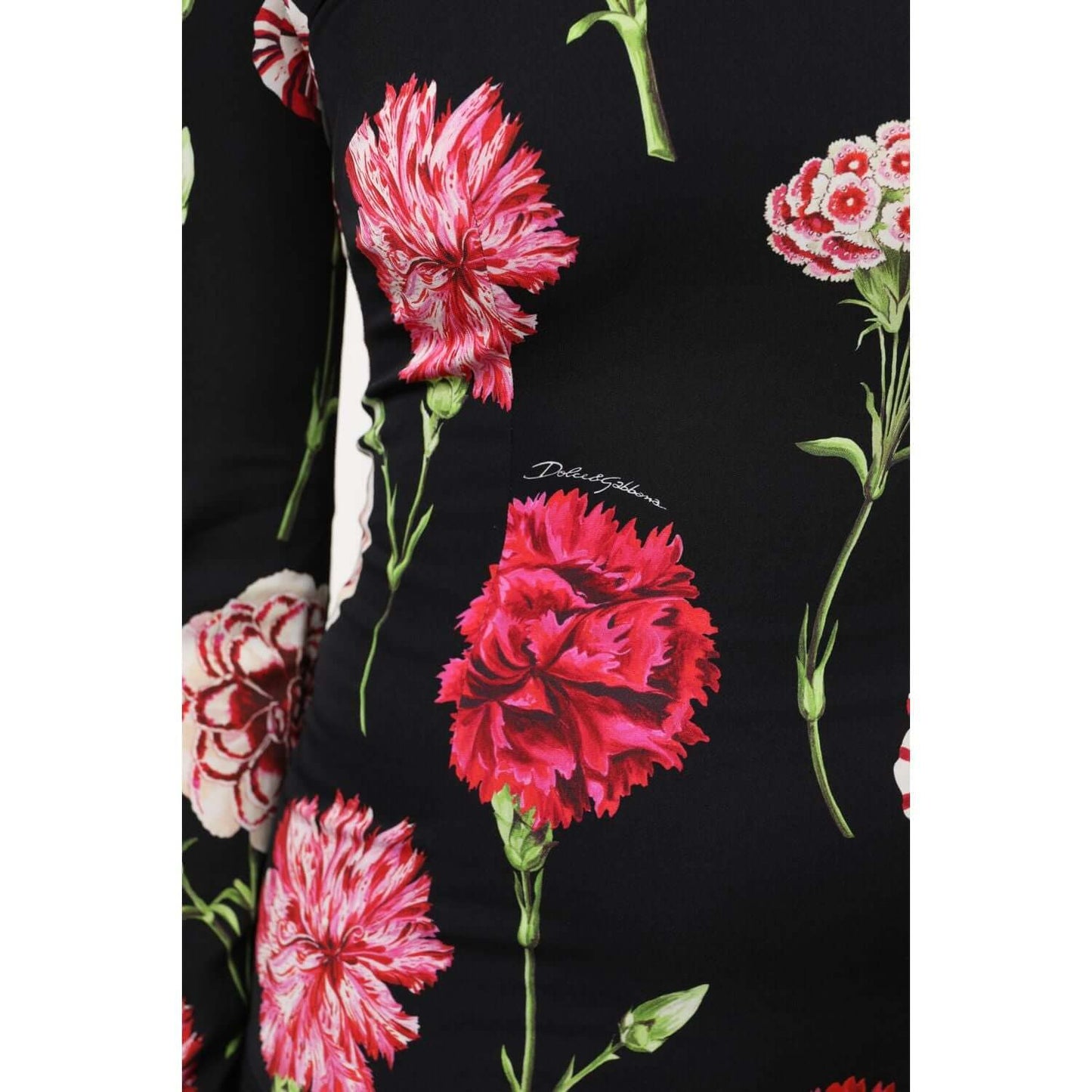 Dolce & Gabbana black floral long sleeve blouse with red and pink flowers on silk elastane fabric, visible logo detail.