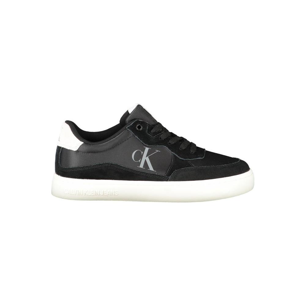 Calvin Klein black polyester men's sneaker with white details, featuring a striking print and sustainable design.