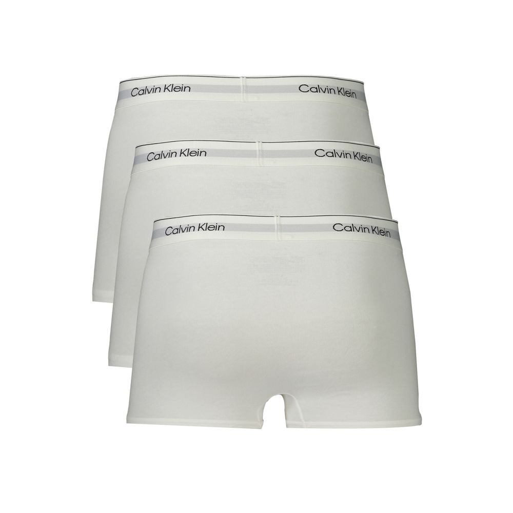Calvin Klein white cotton men's boxer shorts with branded elastic waistband, tri-pack set, sustainable luxury underwear.