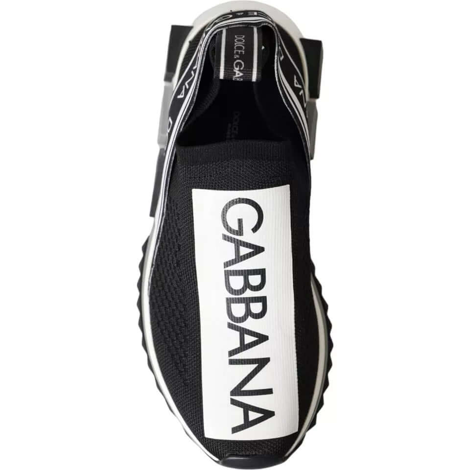 Dolce & Gabbana black and white Sorrento slip-on sneakers with logo print and fabric pull strap.