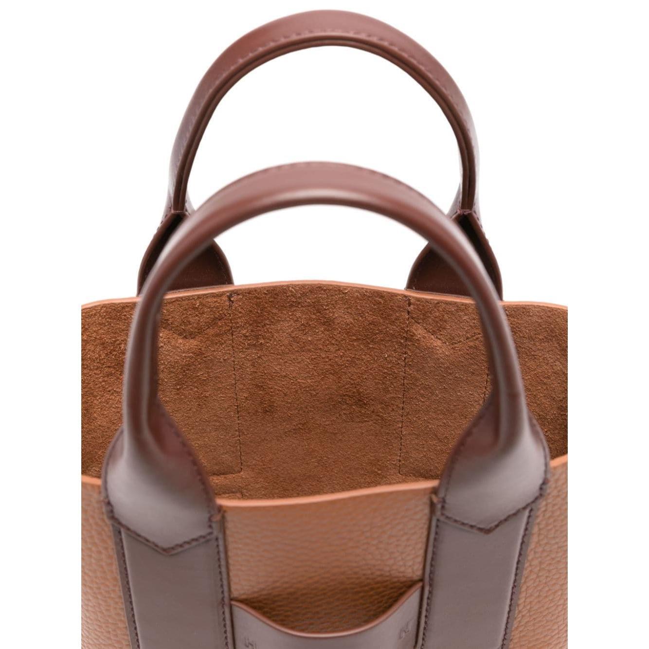 Front view with bag zipped and handles upright.