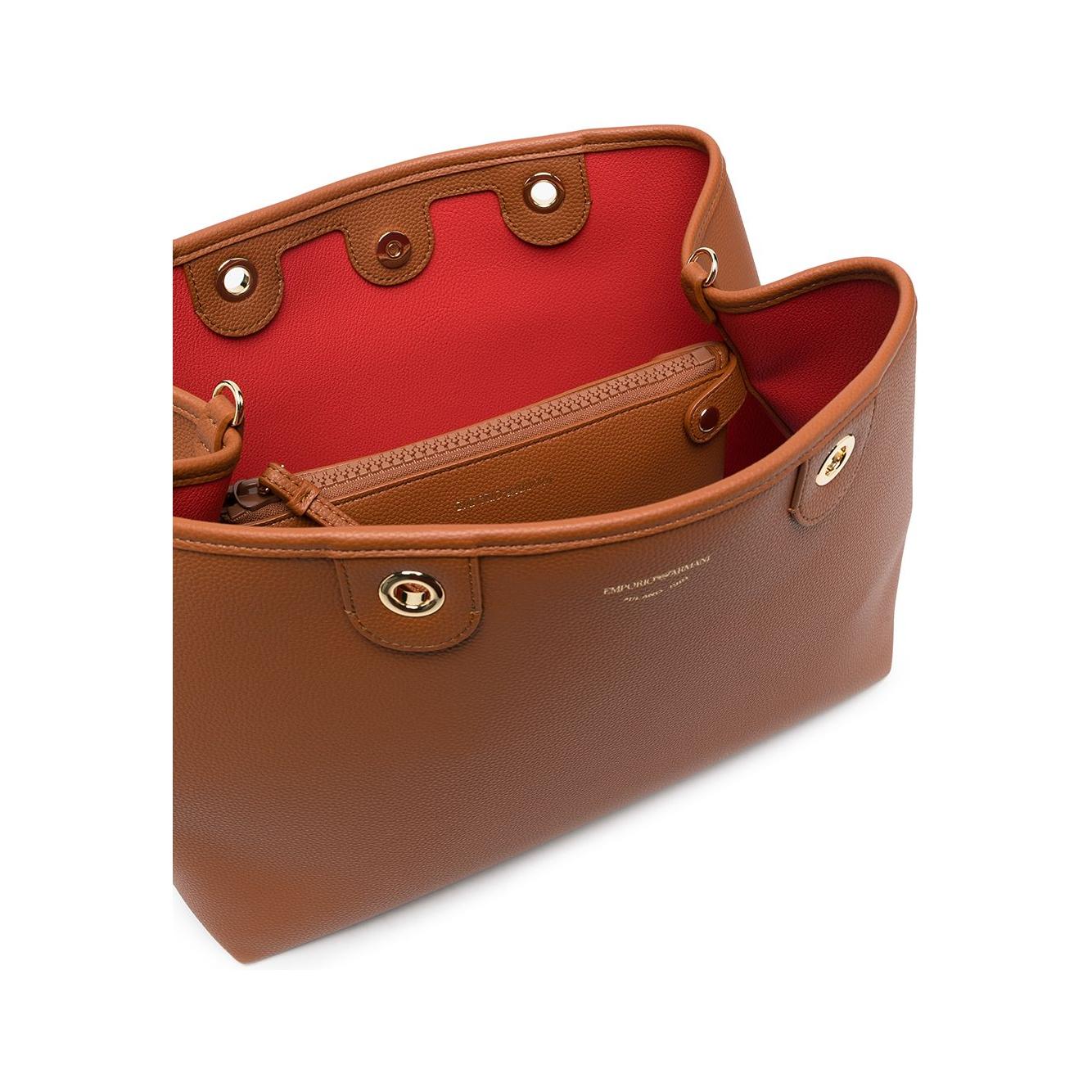 Front view with bag zipped and handles upright.
