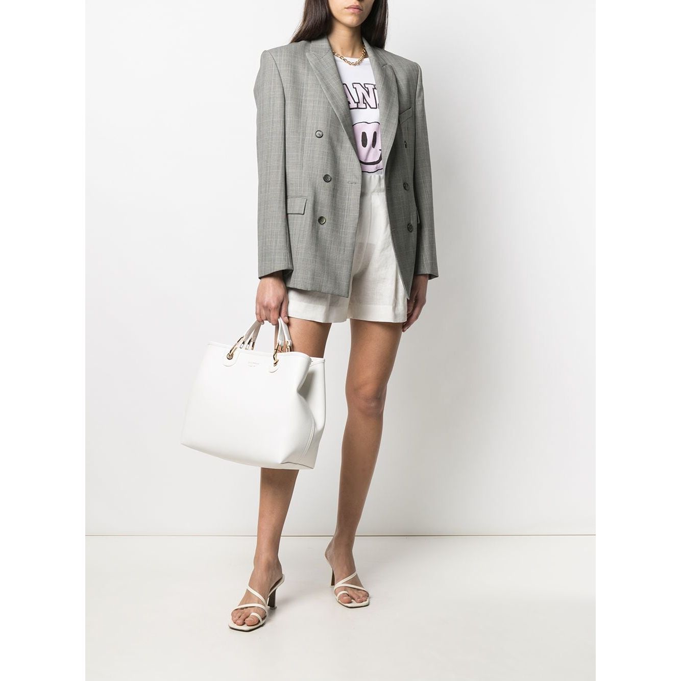 Front view with bag zipped and handles upright.