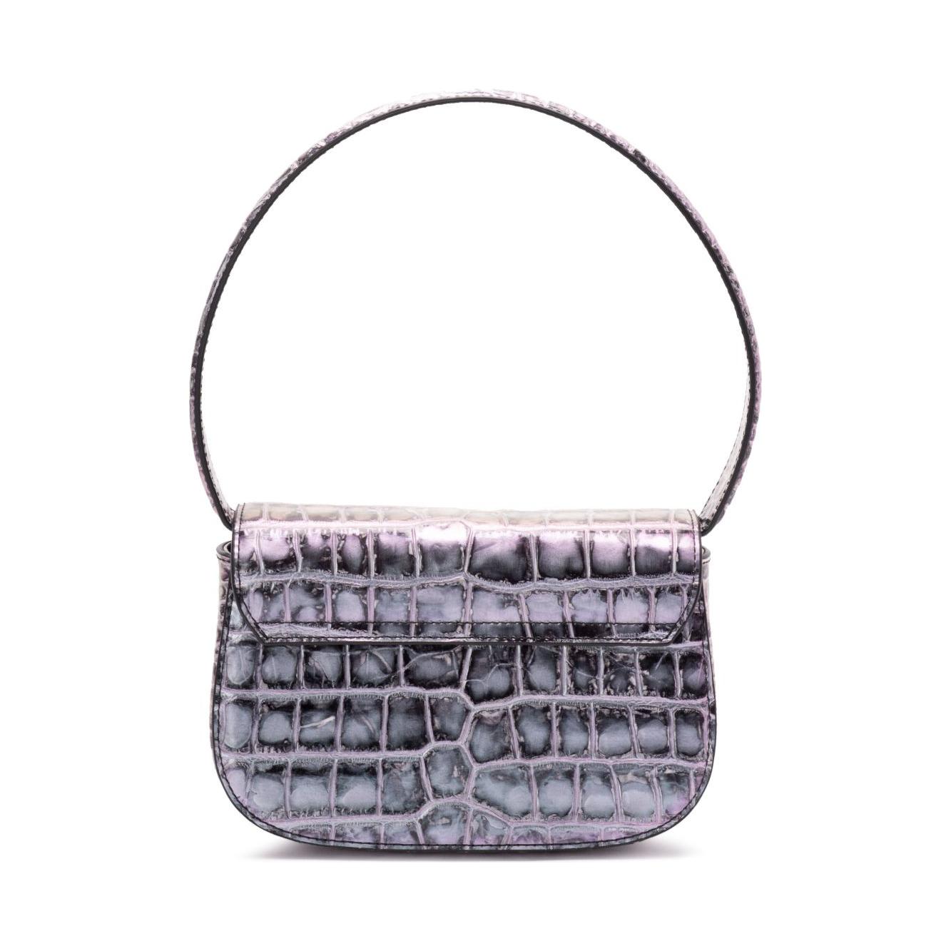 Front view with bag zipped and handles upright.
