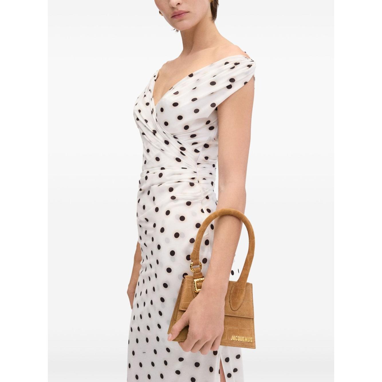 Front view with bag zipped and handles upright.