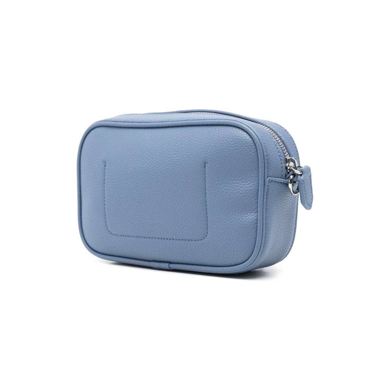 Front view with bag zipped and handles upright.