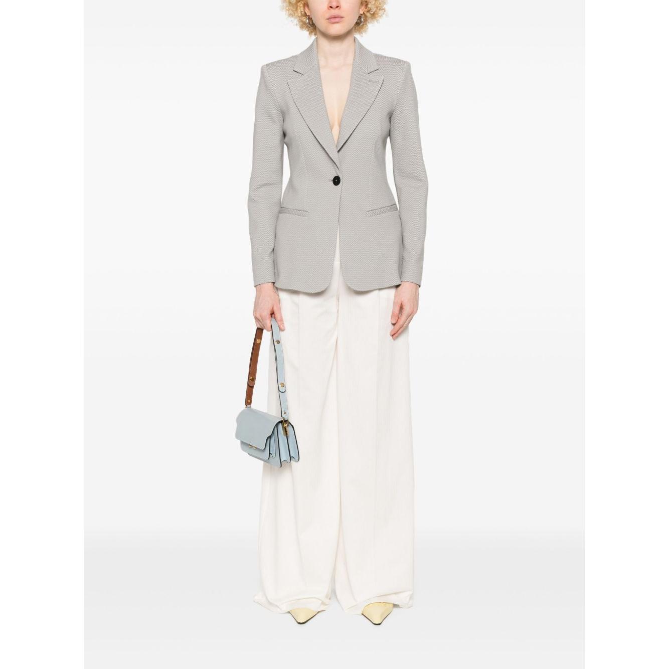 Front view with bag zipped and handles upright.