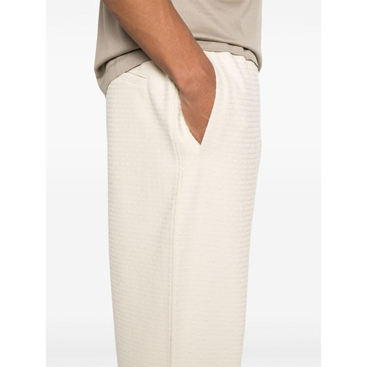 Emporio Armani ASV Lyocell blend jersey joggers with all-over lettering Trousers Emporio Armani Beige
