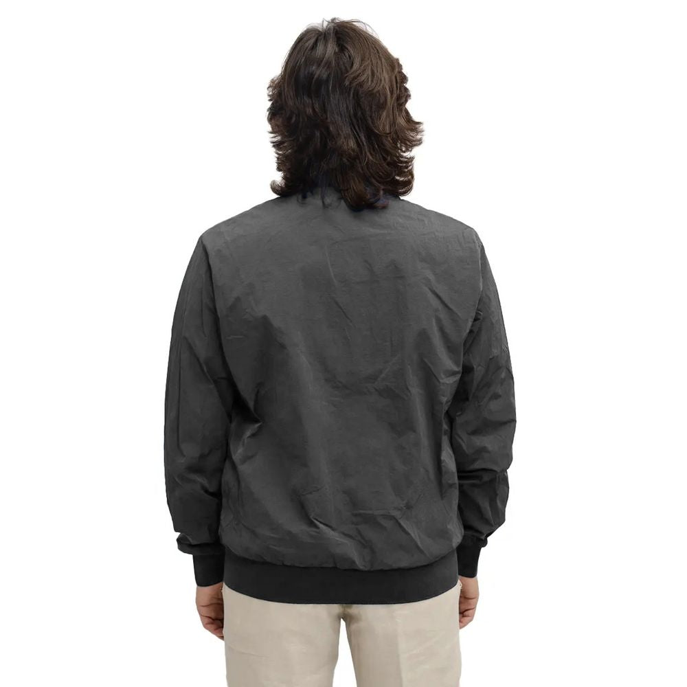 Front view with bag zipped and handles upright.