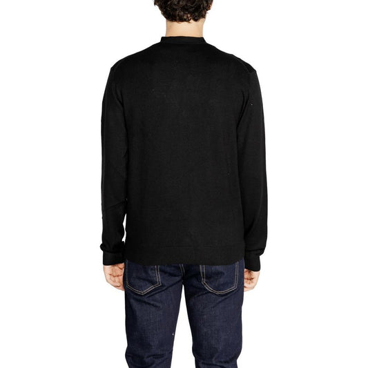 Back view of men's Hamaki-Ho black viscose cardigan, part of the fall/winter knitwear collection with 70% viscose, 30% nylon.