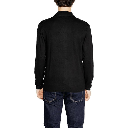 Back view of a Hamaki-Ho black viscose cardigan for men, part of the Fall/Winter collection made from 70% viscose and 30% nylon.