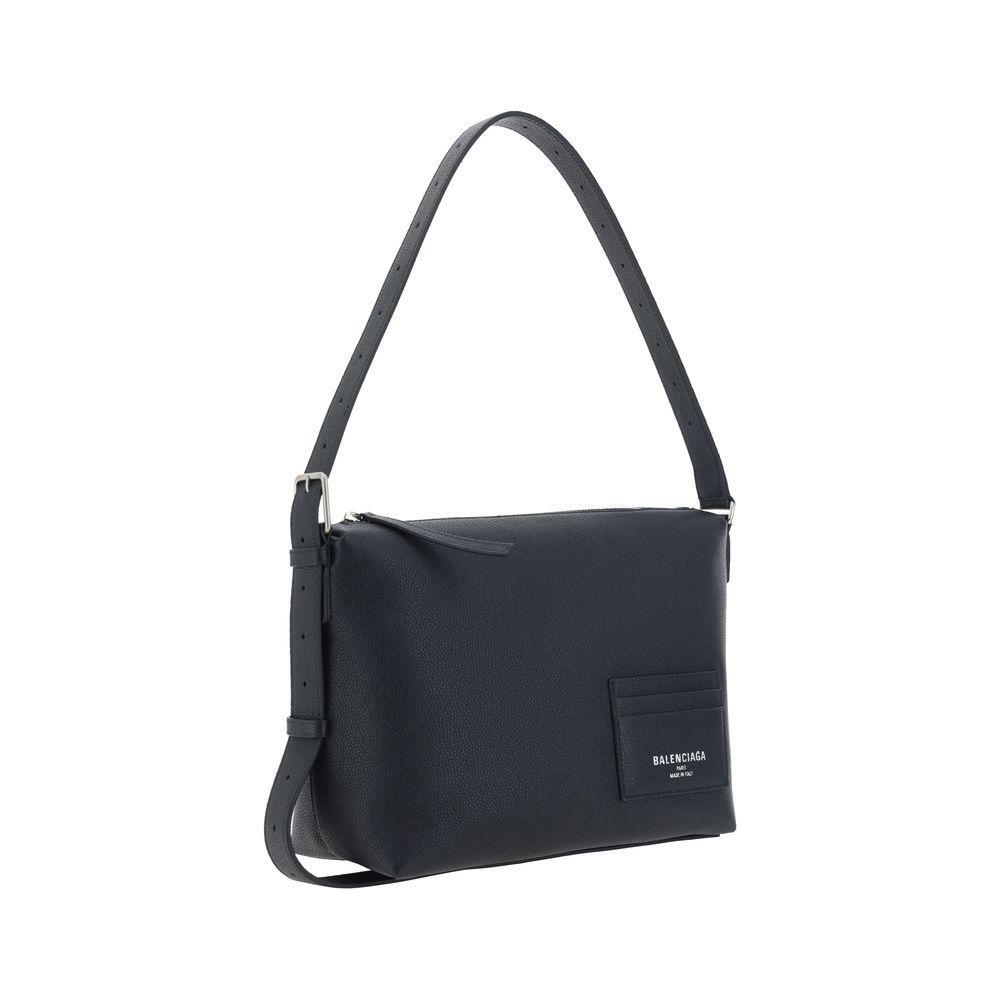 Front view with bag zipped and handles upright.