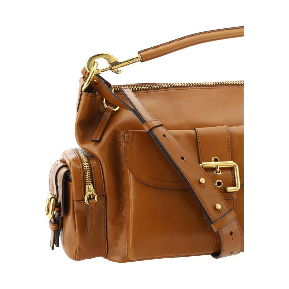 Front view with bag zipped and handles upright.