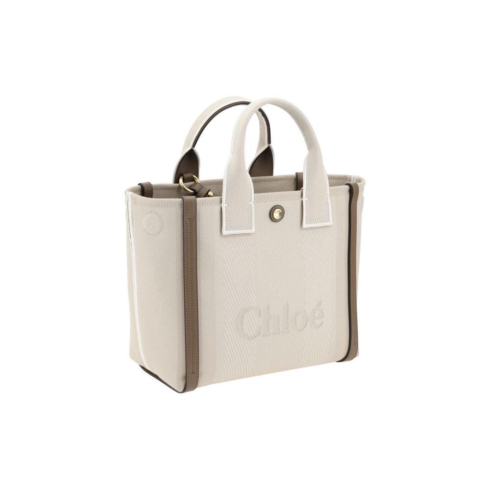 Front view with bag zipped and handles upright.