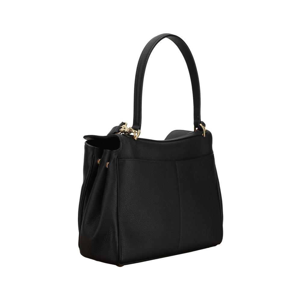 Front view with bag zipped and handles upright.